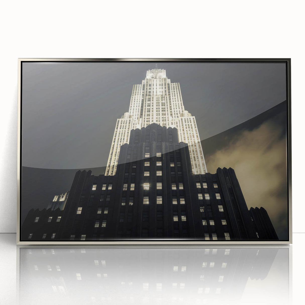 Mid-century modernist art of NYC skyline in muted gray and blue tones on a silver-framed acrylic print.