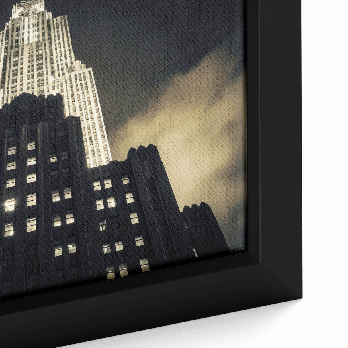 Black wall art featuring a textured New York City skyline in vibrant colors on a framed canvas, ideal for a living room.