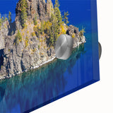 Mid-century modernist style depiction of Crater Lake in muted blue tones on large acrylic glass, ideal for dining room art.