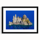 Extra large framed print of Crater Lake with vivid blue and green tones on textured canvas, ideal for living room decor.