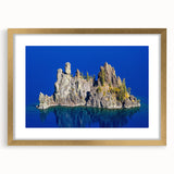 Extra large wall art featuring an abstract depiction of Crater Lake, Oregon, with textured strokes in blue and white.
