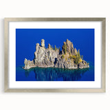 Textured art print of Crater Lake in muted blue and green tones, silver-framed with mat, suitable for bedroom art.