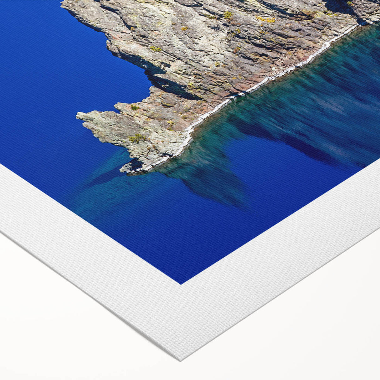 Art deco style poster of Crater Lake, Oregon, featuring deep blue and green tones on a rolled canvas.
