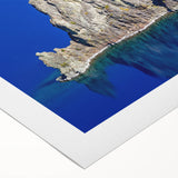 Art deco style poster of Crater Lake, Oregon, featuring deep blue and green tones on a rolled canvas.