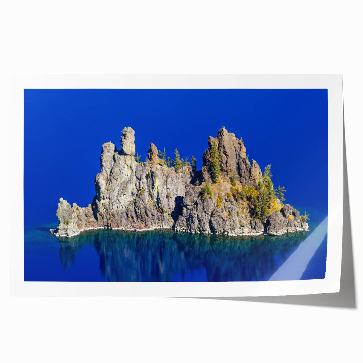 Crater Lake under clear blue skies on a rolled canvas print, suitable as art wall for dining rooms.