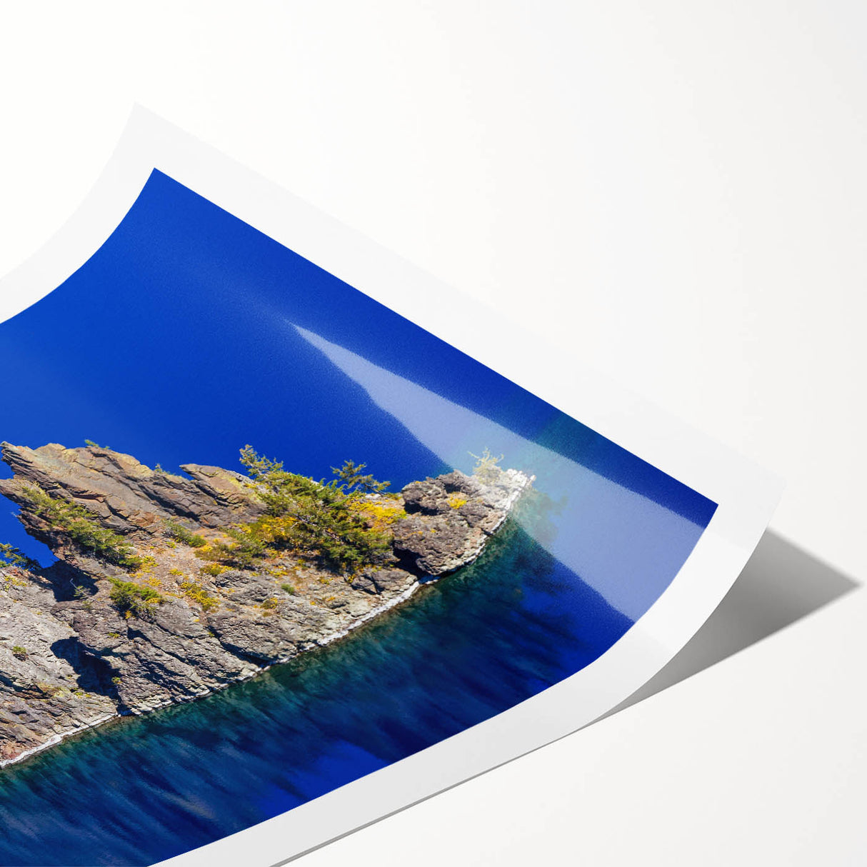 Extra large wall art featuring Crater Lake, Oregon, depicted in vibrant blue and green hues on a rolled canvas print.