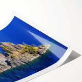 Extra large wall art featuring Crater Lake, Oregon, depicted in vibrant blue and green hues on a rolled canvas print.
