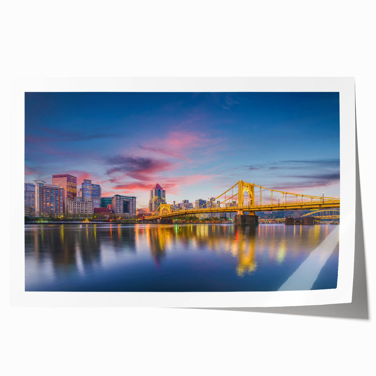 Rolled print of Pittsburgh skyline in muted gray and blue tones, ideal for art wall dining room.