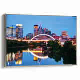 Framed canvas landscape art painting of Nashville skyline in muted gray with colorful accents, ideal for office decor.