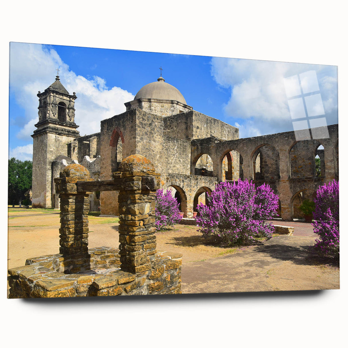 Large abstract depiction of San Antonio skyline in muted blue and gray tones on acrylic glass.