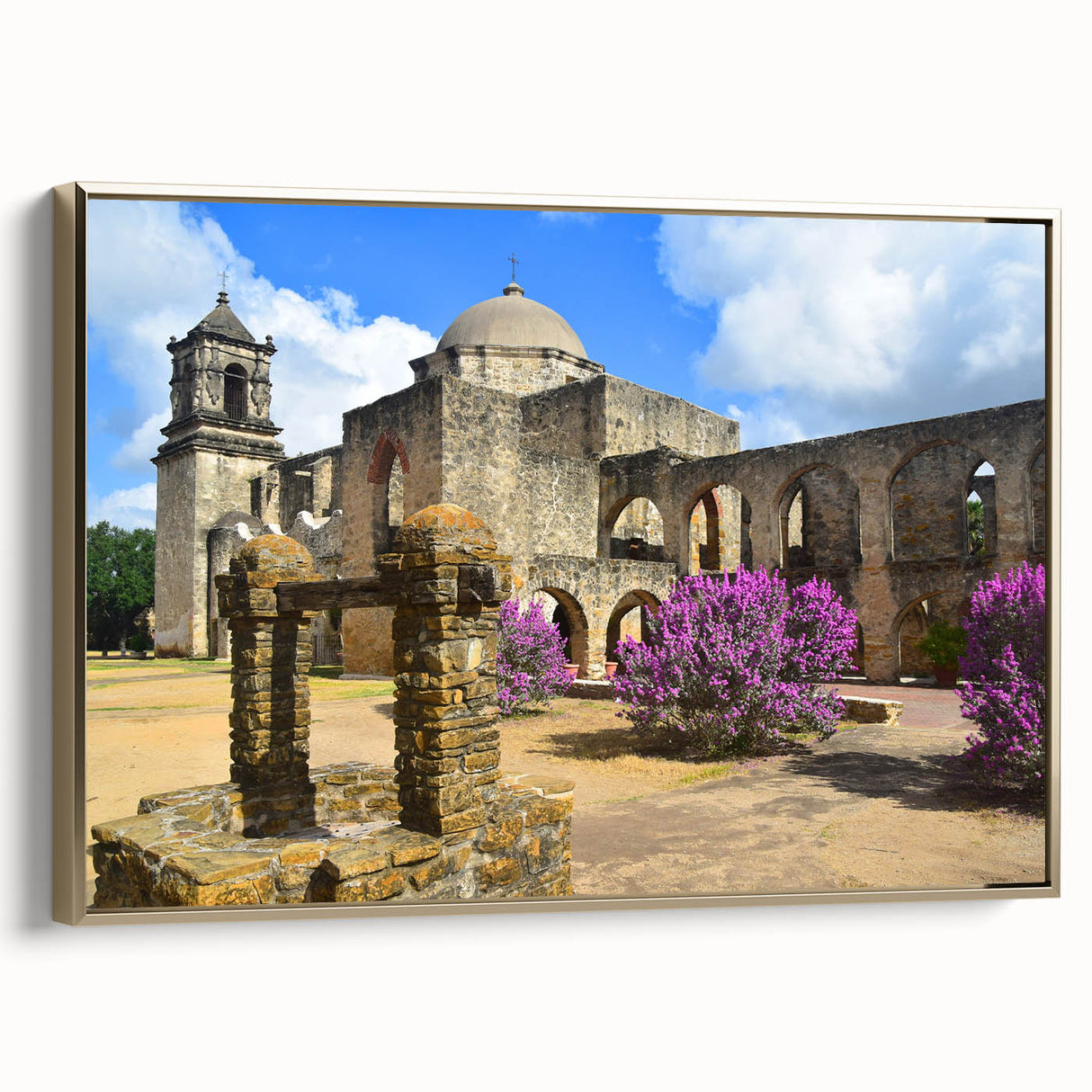 Framed canvas wall art depicting a vintage-style San Antonio landscape in muted gold and black tones.