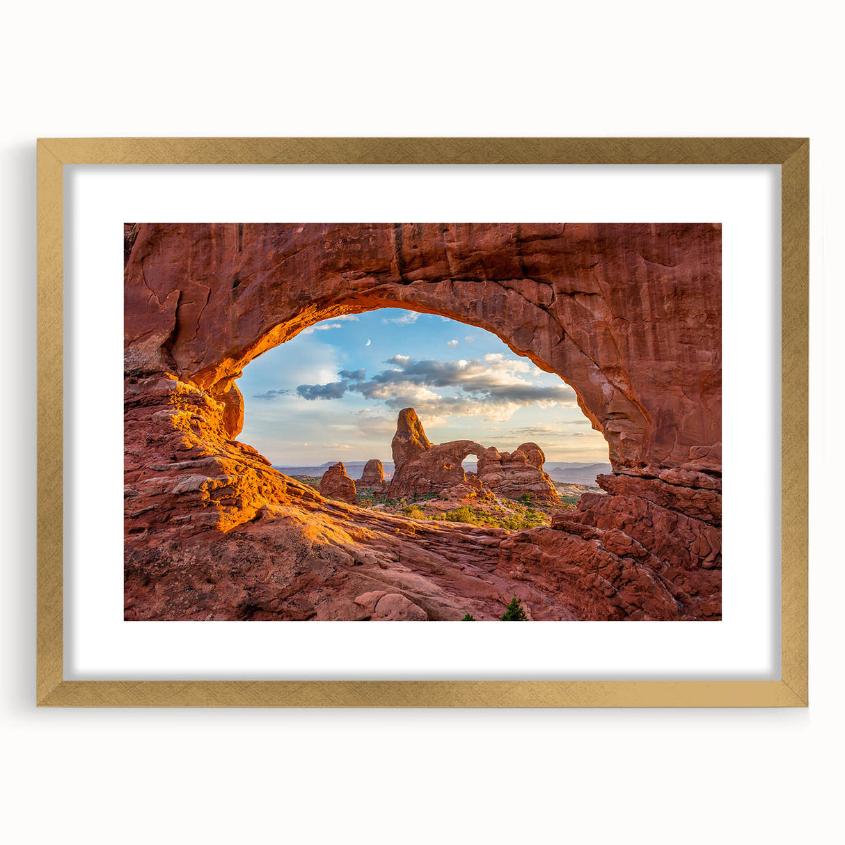 Extra large wall art depicting abstract Utah Arches in textured orange and red hues, framed in gold.