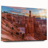 Large abstract wall art of Bryce Canyon in vibrant orange and red hues on acrylic glass.