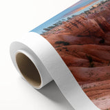 Art deco poster of Bryce Canyon in muted orange and red tones on rolled canvas, ideal for nursery wall art.