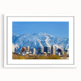 Abstract art print of Salt Lake City with muted earth tones on a white-framed canvas, suitable for dining room decor.