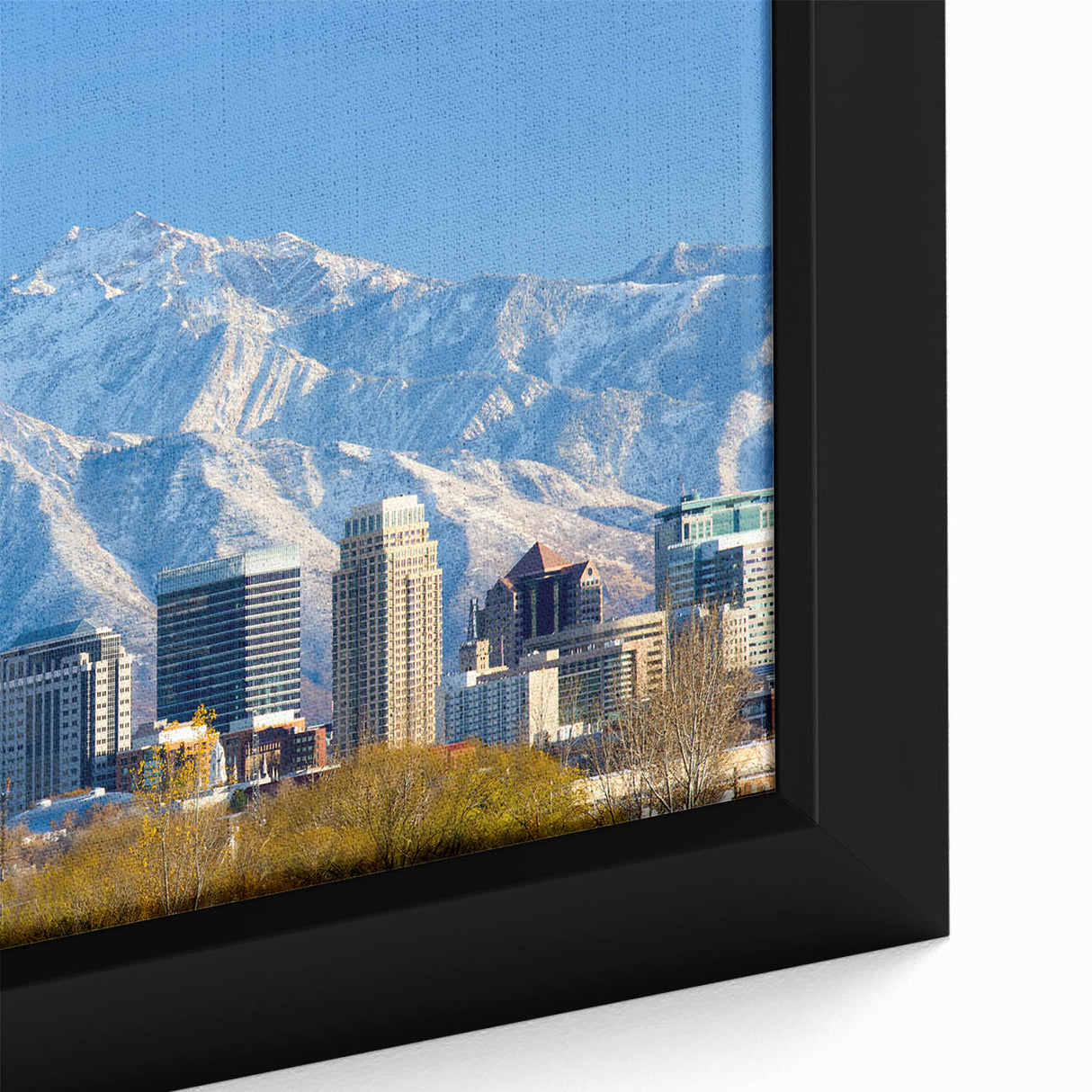 Extra large framed canvas of Salt Lake City with a black textured skyline against a colorful sunset.