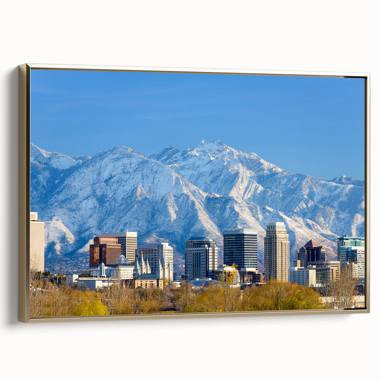 Framed canvas wall art depicting a vintage-style Salt Lake City landscape in muted gold and black tones.