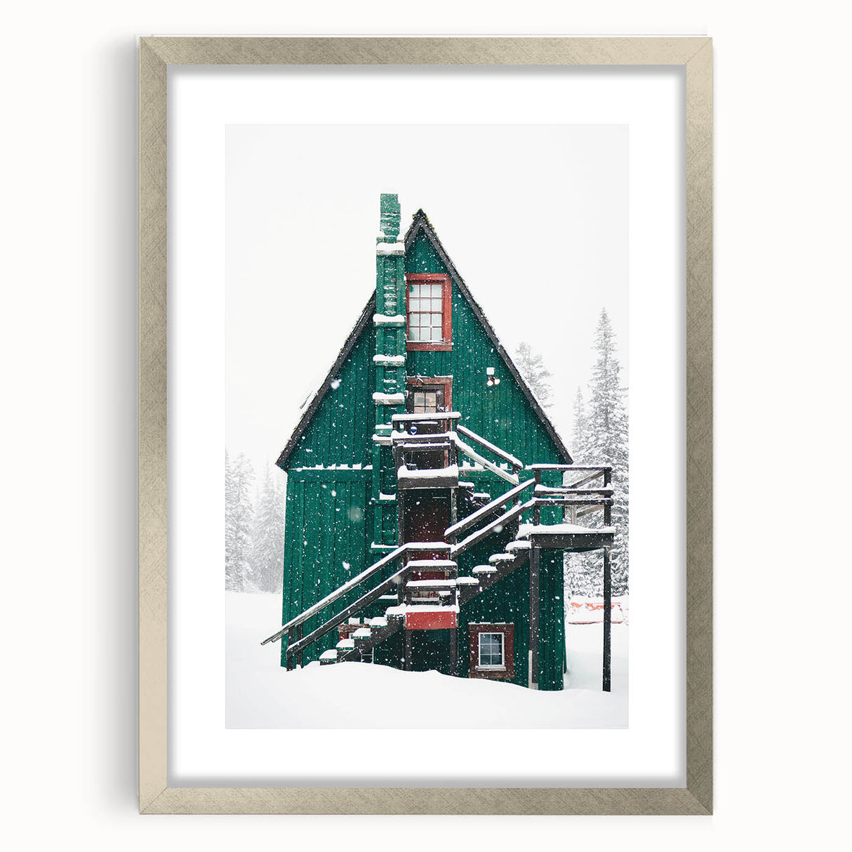 Textured abstract art print depicting a winter scene in muted blue and white tones, framed in silver, ideal for bedroom art.