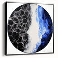 Abstract geometric framed canvas artwork showcasing a modern black design with sleek lines and shapes, perfect for contemporary home decor.
