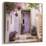 Framed canvas featuring a vintage poster of a Greek door architecture in black, silver, and gold tones.