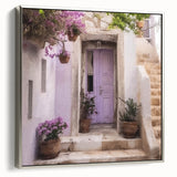Framed canvas of a vintage poster featuring a black and colorful Greek door, ideal for adding character to a living room.