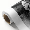 Art Deco poster featuring a stylized couple dining, in muted gold and black tones on rolled canvas.