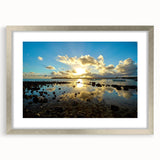 Abstract art print of a Mauritian landscape in muted earth tones on a framed silver mat, ideal for dining room decor.