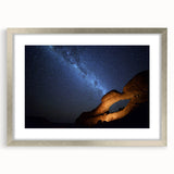 Abstract art print of the Namibian landscape in muted earth tones on a framed silver mat, suitable for dining room decor.