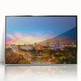 Mid-century modernist art depicting an African savannah scene in muted earth tones on a silver-framed acrylic print.