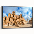 Framed canvas featuring a black and white vintage poster art of a Tunisian landscape, ideal for bedroom wall decor.