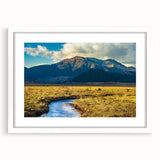 Abstract art print of a Bhutanese landscape in muted earth tones on a white-framed canvas, suitable for dining room decor.