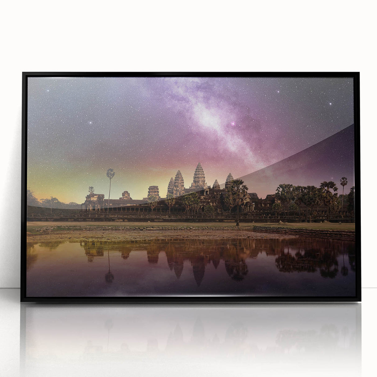 Large abstract wall art depicting a Cambodian scenery in muted earth tones, framed in black acrylic.