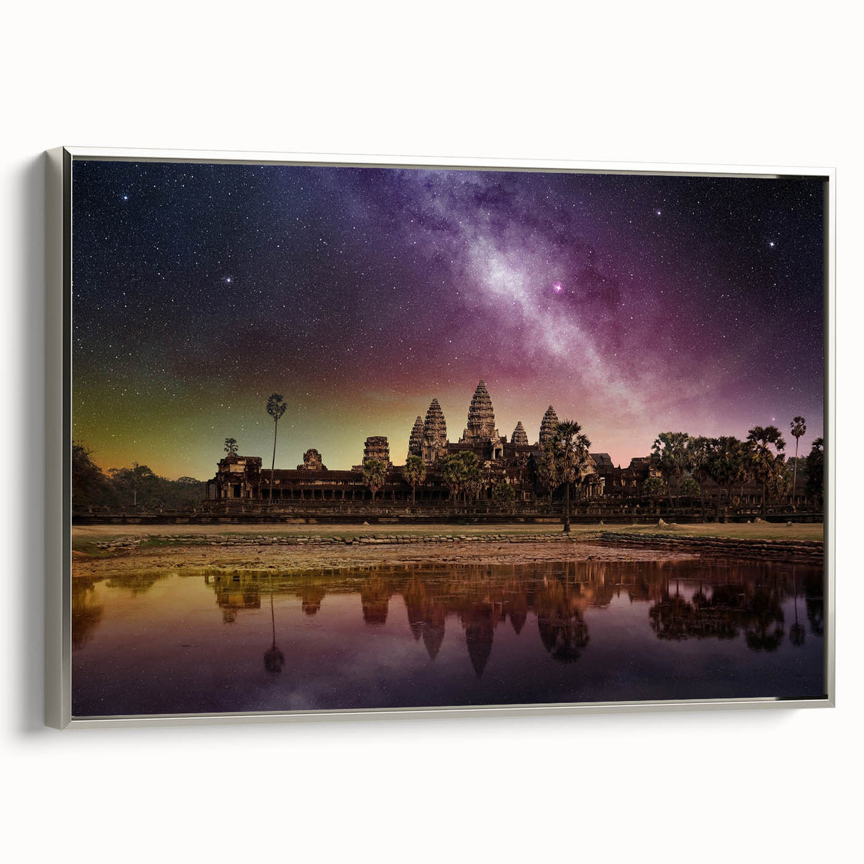 Framed canvas depicting a vintage-style landscape painting of a Cambodian scenery in muted earth tones.