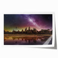 Extra large rolled print of Cambodian scenery with lush greenery and temple, in muted earth tones.