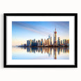 Extra large abstract art print of colorful Shanghai skyline, textured appearance on black framed canvas.