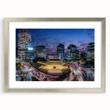 Textured abstract art print of Seoul skyline in muted gray and blue tones on a framed silver mat, suitable for bedroom art.