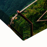 Large art featuring a black and white landscape painting of a serene Korean scenery on stretched canvas.