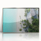 Mid-century modernist art featuring a serene Maldives beach scene in muted blue and white tones, silver-framed acrylic.