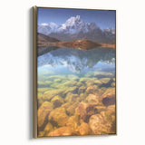 Framed canvas featuring a vintage-style landscape painting of a Nepalese scenery in muted gold and black tones.