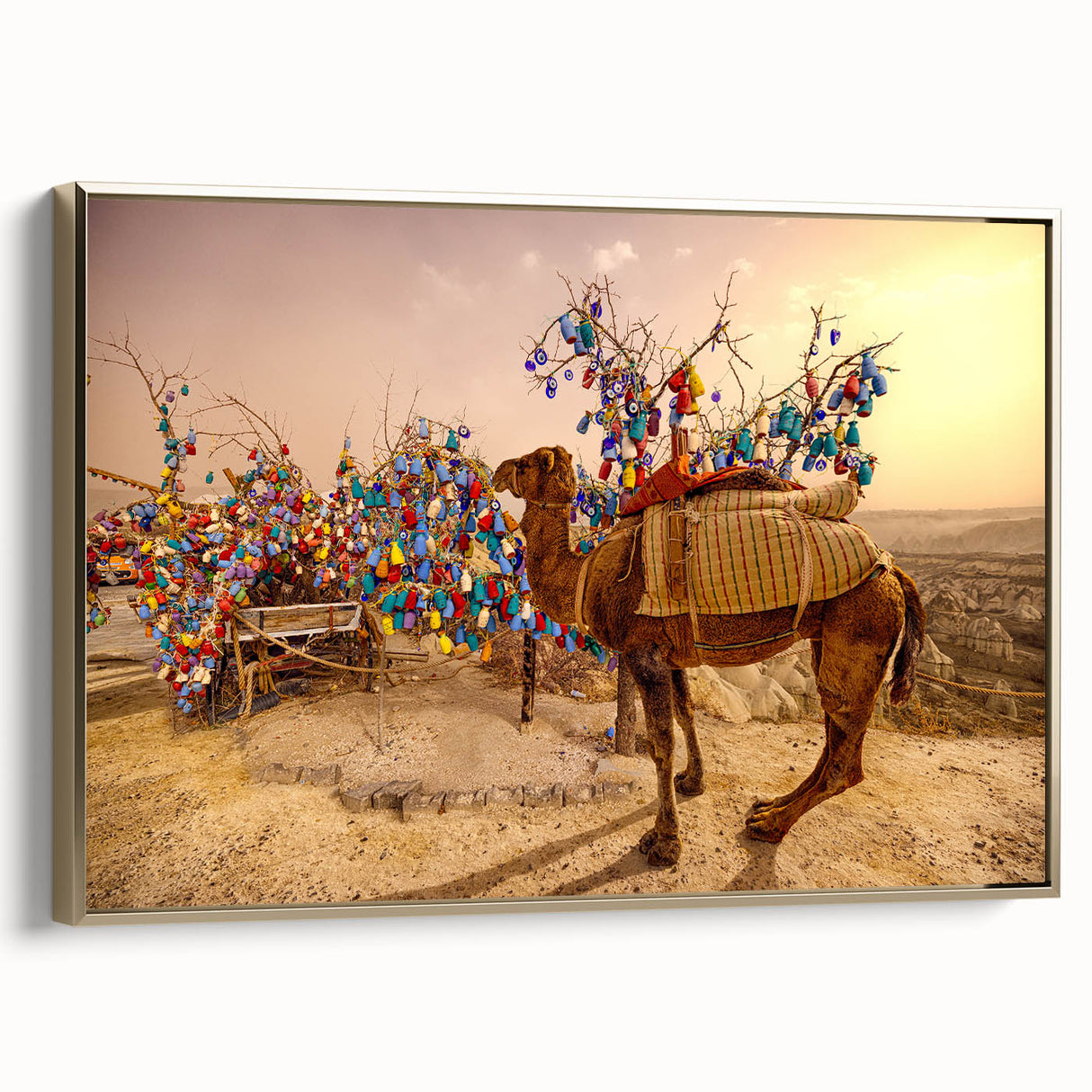 Framed canvas depicting a vintage-style landscape of a Turkish scenery in muted gold and black tones.