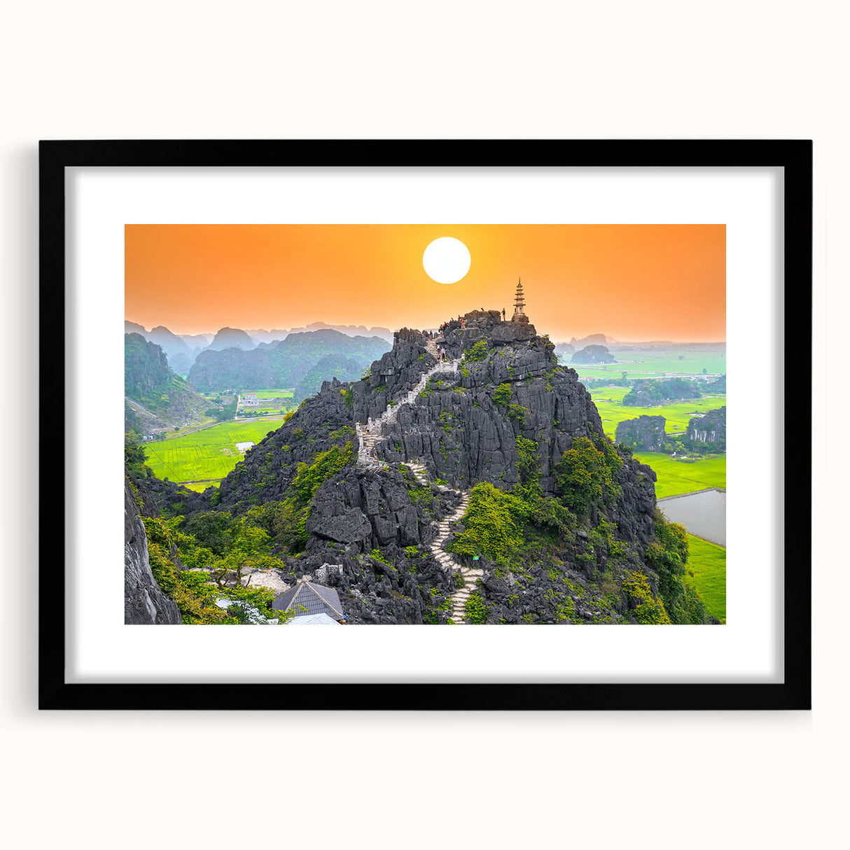 Extra large abstract art print of a colorful, textured Vietnamese landscape on a black framed canvas.