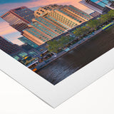 Art deco poster of Melbourne skyline in muted gold and navy tones on rolled canvas, suited for dining room wall art.