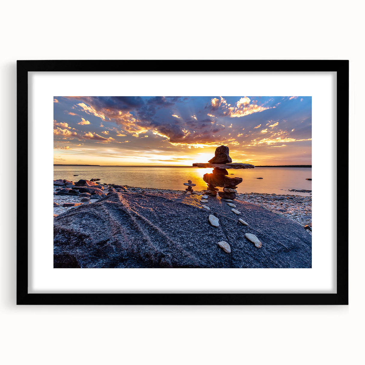 Abstract art print of colorful, textured scenery in Manitoba on a large canvas, framed in black, ideal for living room decor.