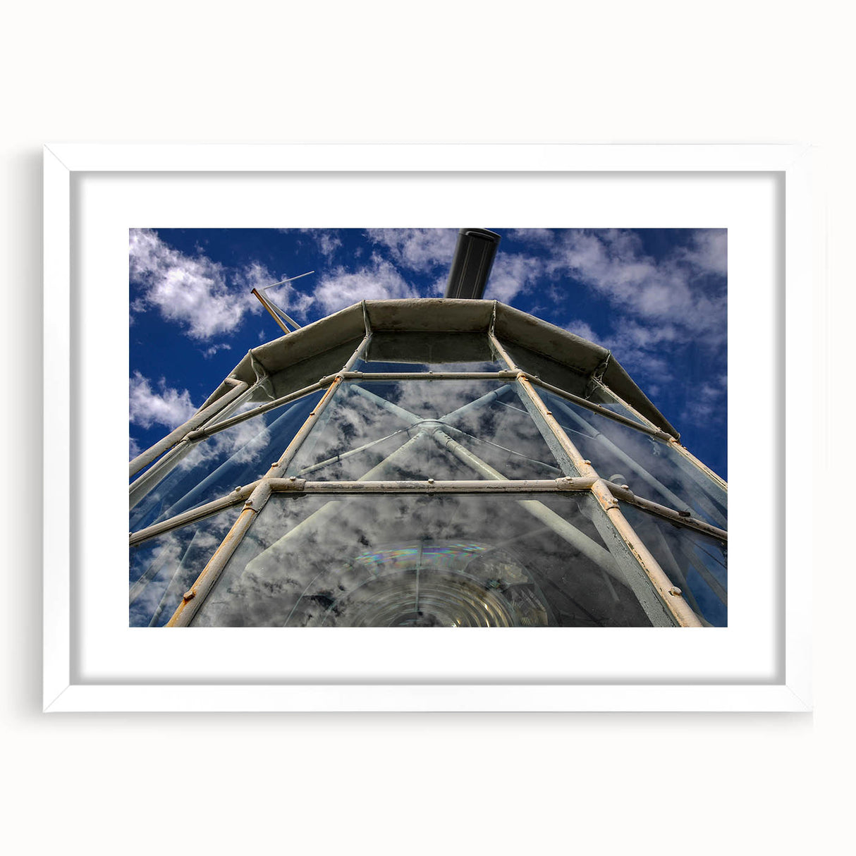 Extra large textured abstract art print depicting Caribbean scenery in muted blues and greens, framed with a white mat.