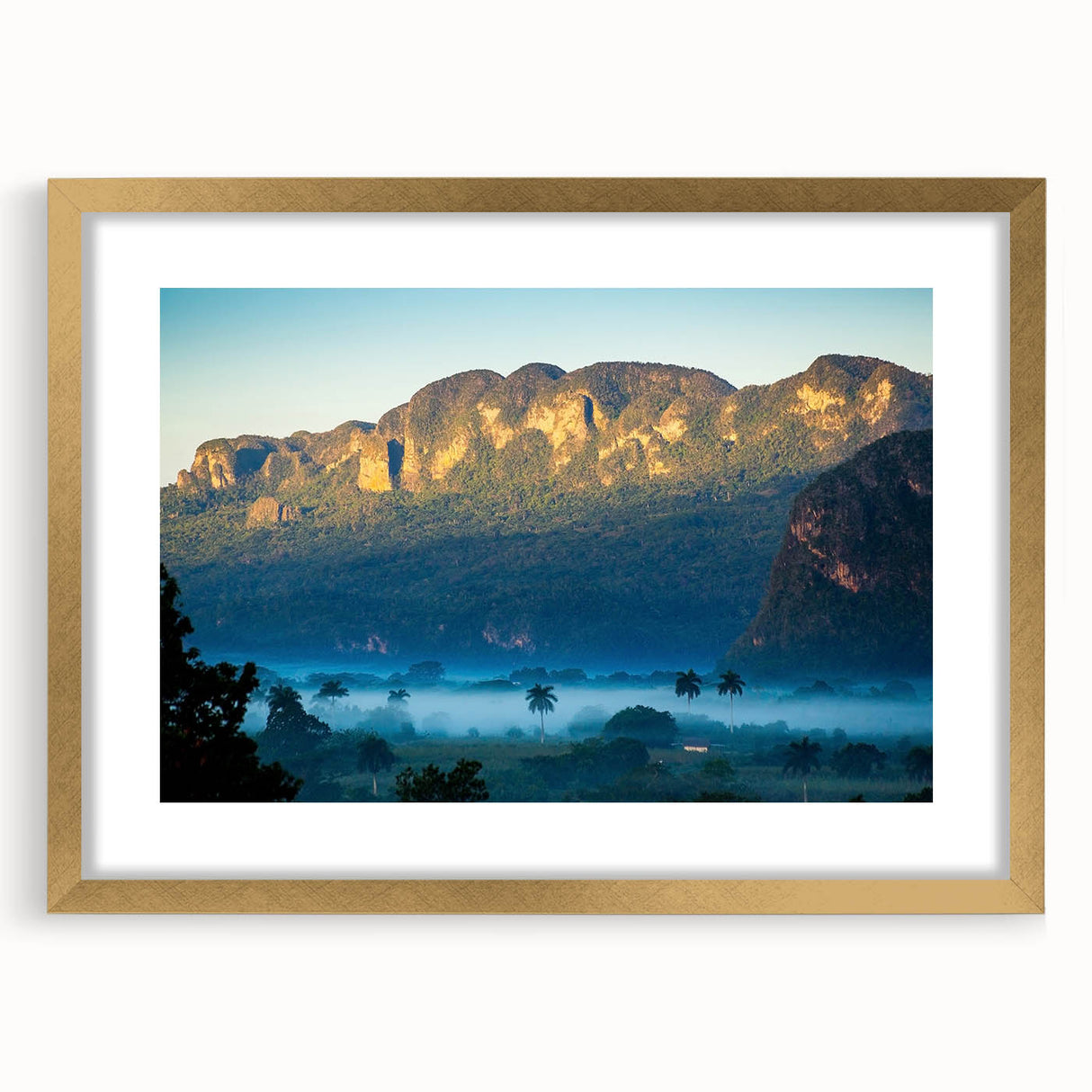 Abstract art print of a Caribbean scene in gold frame, with vibrant blue and green tones, ideal for dining room decor.