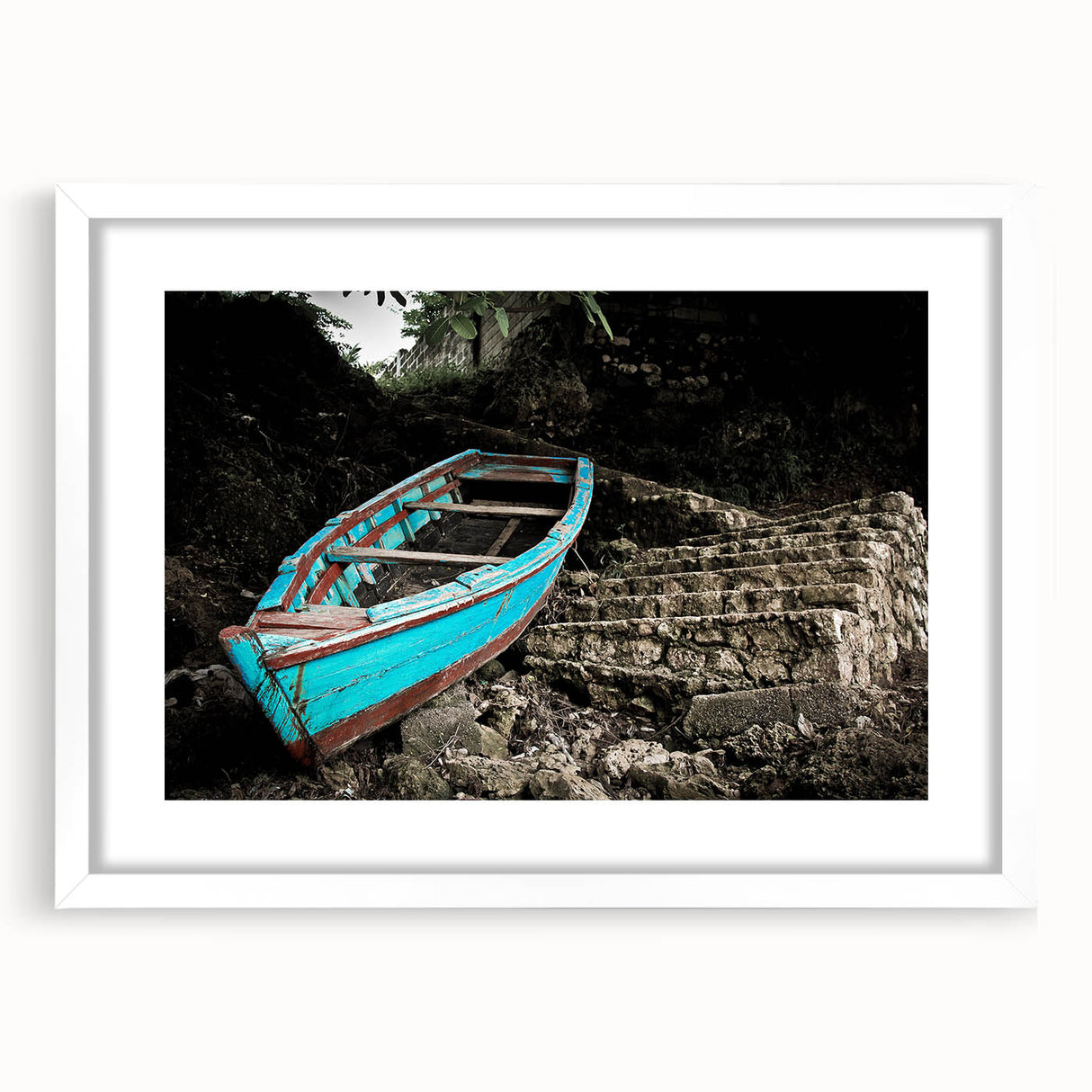 Extra large abstract art print depicting a Caribbean scenery in vibrant blue and green, framed with a white mat.
