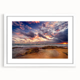 Extra large abstract art print of Caribbean scenery in muted blue and green tones on a textured canvas, framed in white.