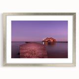 Textured abstract art print of Central America scenery in muted earth tones, framed in silver, ideal for bedroom art.