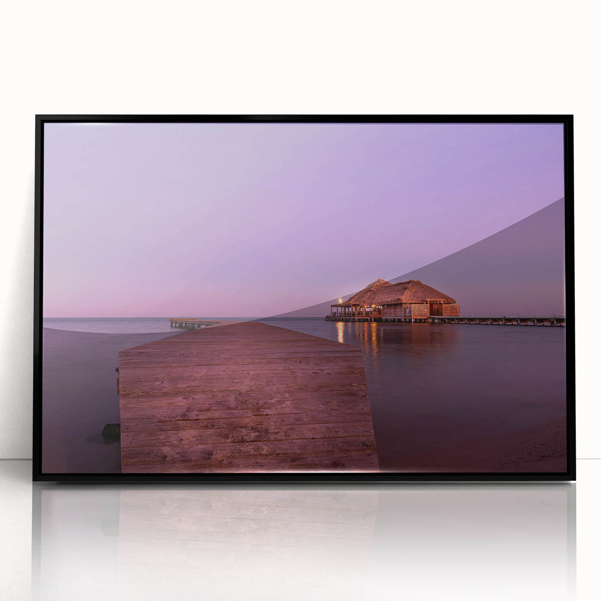 Large abstract wall art depicting a Central American landscape in muted earth tones, framed in black acrylic.