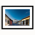 Abstract art print of a vibrant, colorful Central American scenery on a large textured canvas, framed in black.